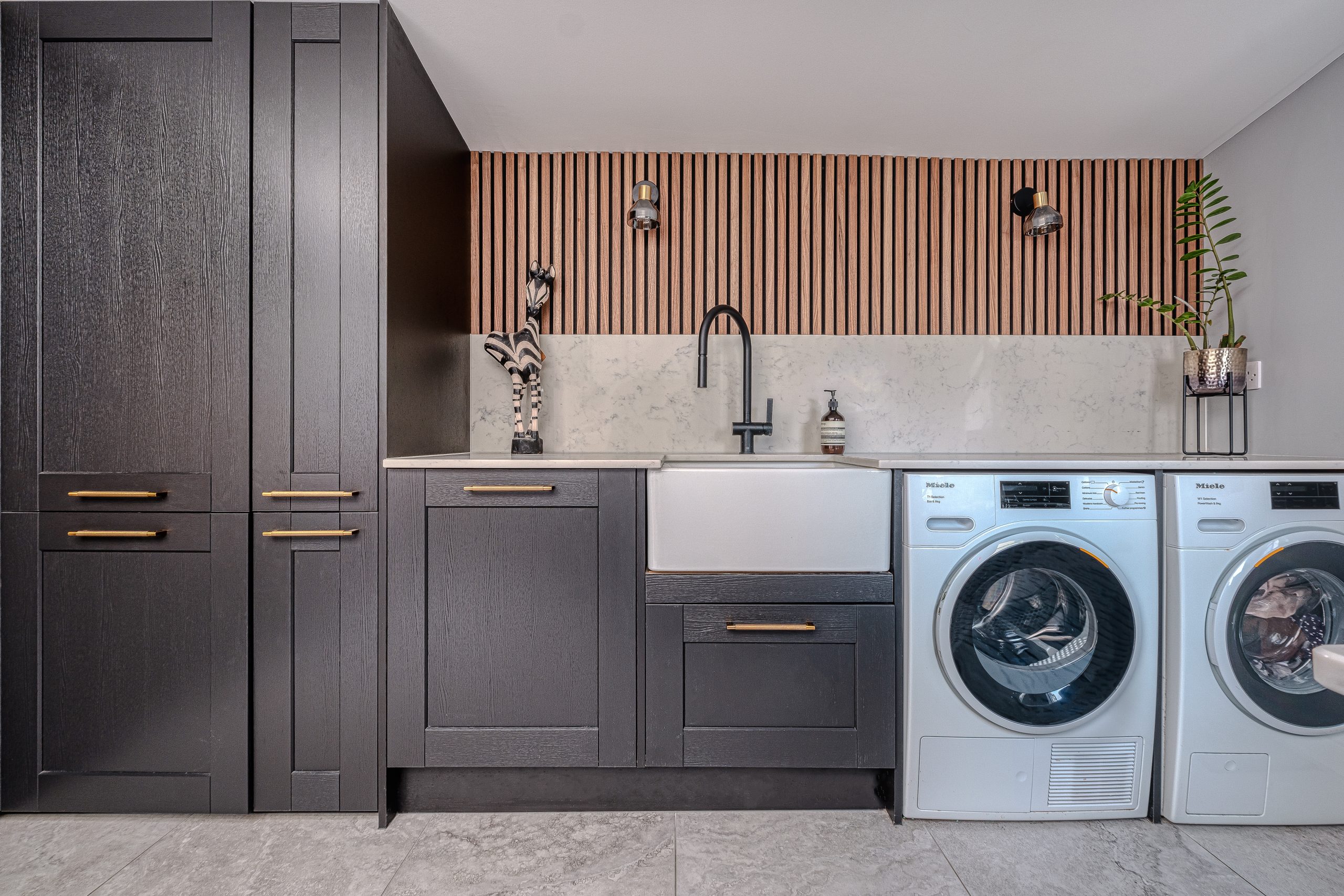 Cool utility room/ laundry room with wood panelling